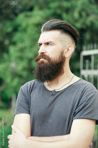 Bearded man on blue sky
