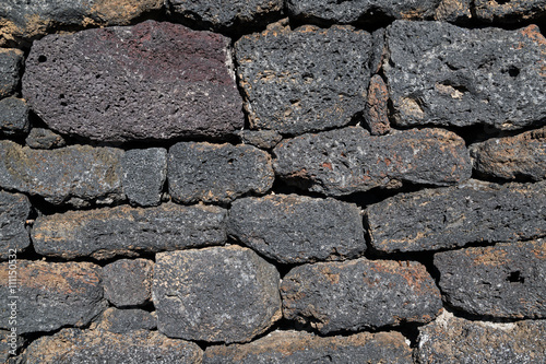 Wall made of volcanic bricks