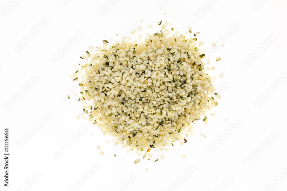 Heap of blanched hemp seeds , on white background Heap of blanched hemp seeds , on white background