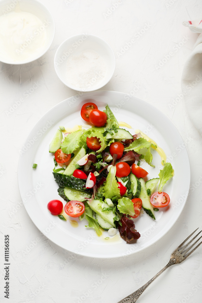 summer salad on white plate summer salad on white plate