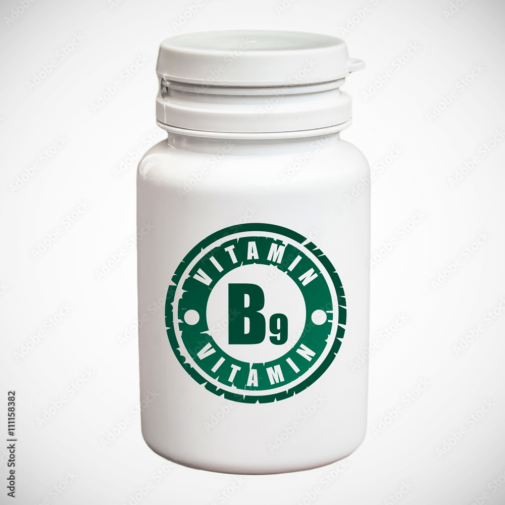 Bottle of pills with vitamin B9 Bottle of pills with vitamin B9