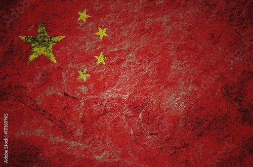 China flag on a dark grungy stone background