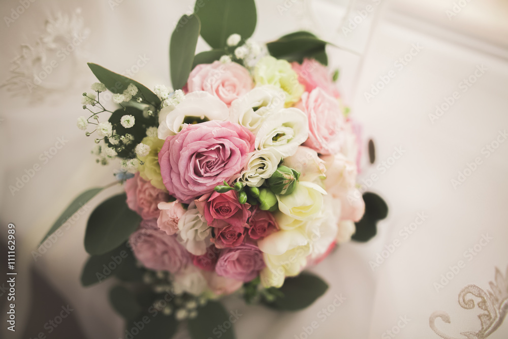 Obraz premium Wedding perfect bridal bouquet of different flowers