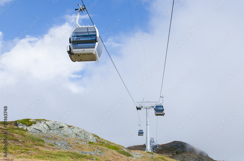 Cable Car in summer of Switzerland with sky background Cable Car in summer of Switzerland with sky background