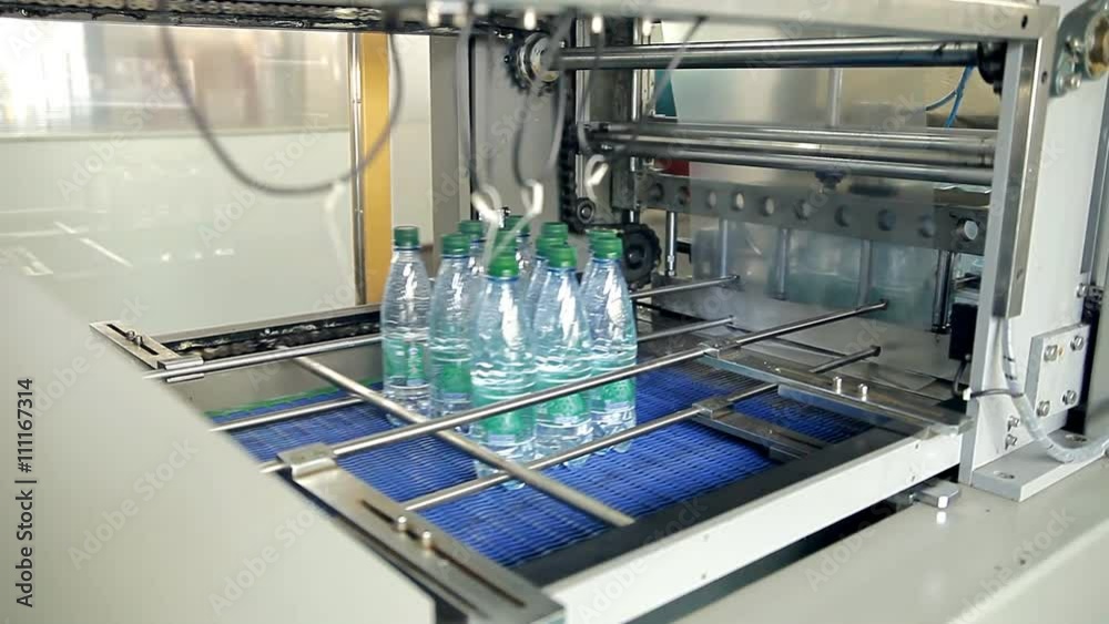 Packaging of bottles with artesian water Packaging of bottles with artesian water