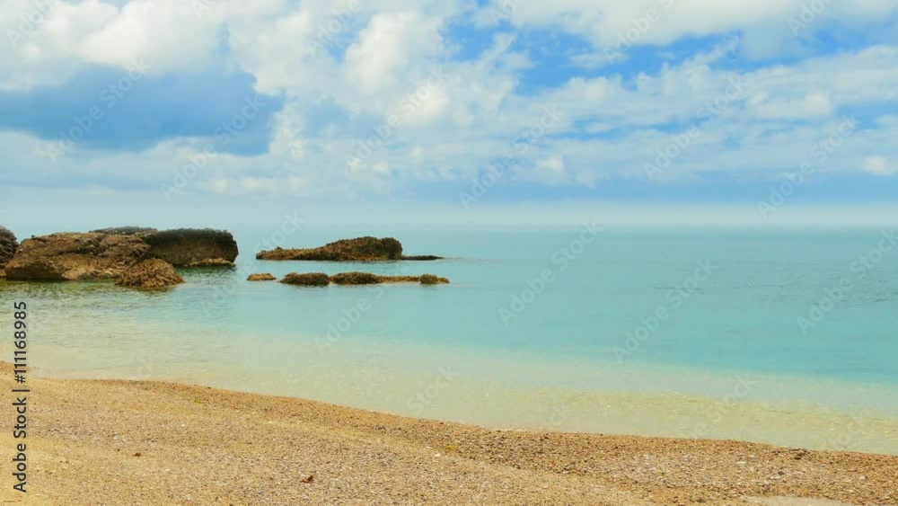 Sea waves crashing over rocks on wildest beach in Montenegro