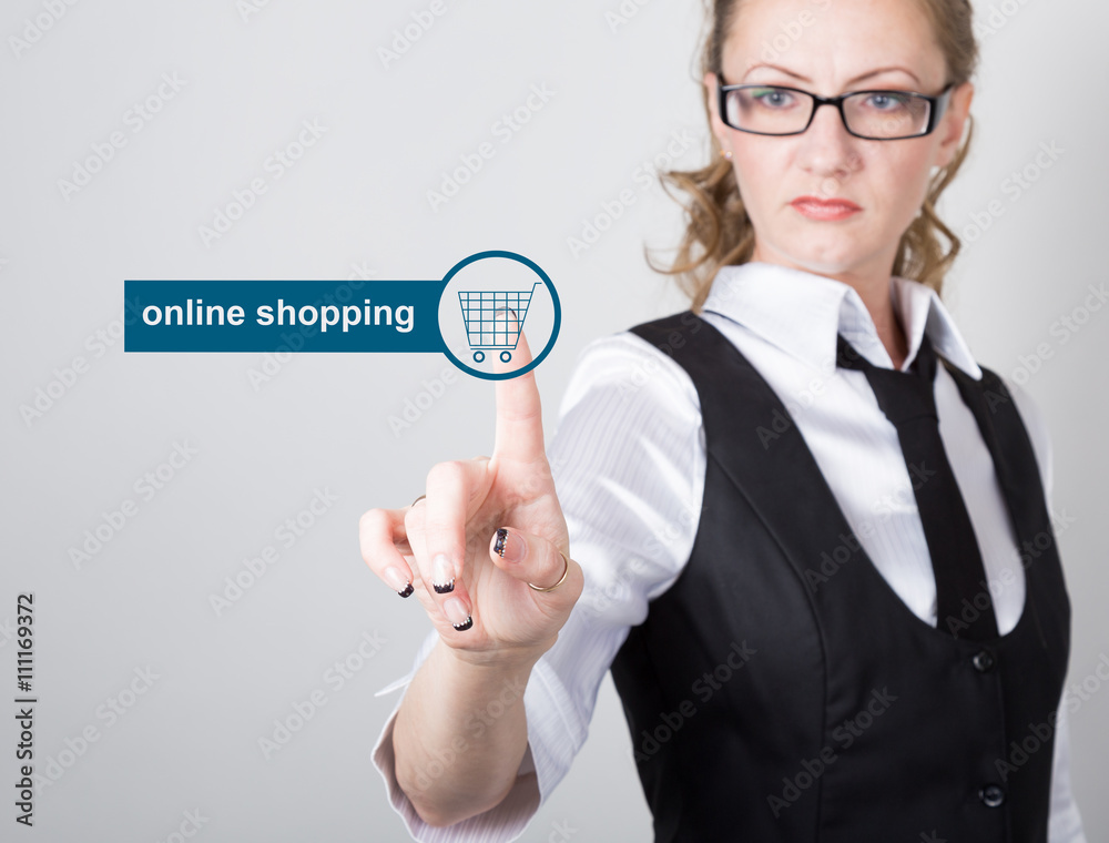 technology, internet and networking concept. beautiful woman in a black business shirt. woman presses online shopping button on virtual screens technology, internet and networking concept. beautiful woman in a black business shirt. woman presses online shopping button on virtual screens