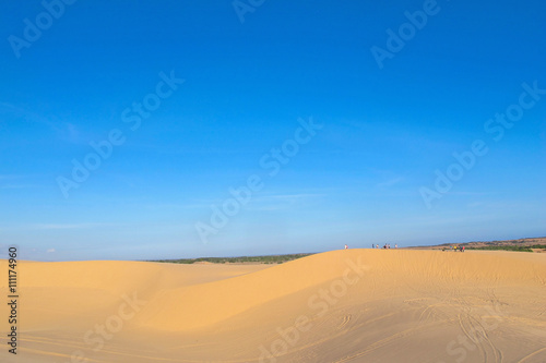 white sand dune desert and lake in Mui Ne, Vietnam