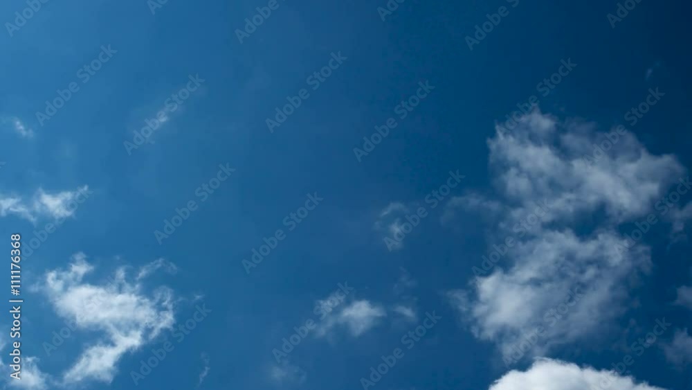 Time lapse clip of white fluffy clouds over blue sky. Beautiful cloudscape. Time lapse clip of white fluffy clouds over blue sky. Beautiful cloudscape.