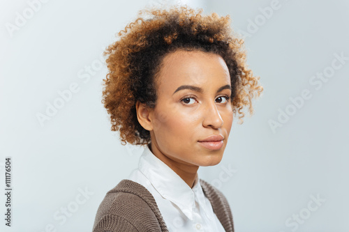 Beautiful african american businesswoman with curly hair photo