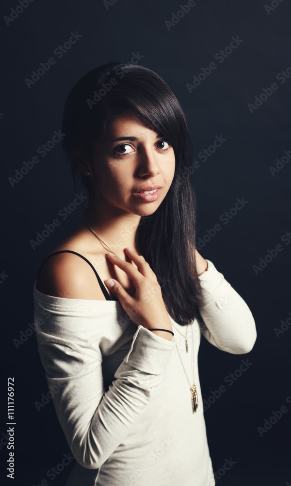 Portrait of beautiful Hispanic latino white girl woman with dark brown eyes,  long dark hair in