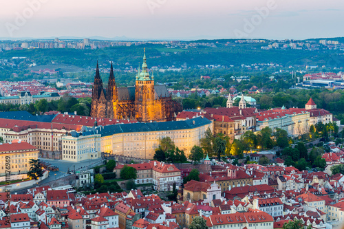 View of Prague Castle with St. Vitus Cathedral from Petrin Tower at blue hour, Czech Republic