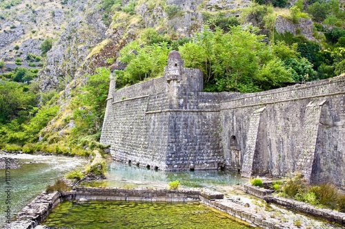 Kotor old town north defensive walls and Scurda river  photo