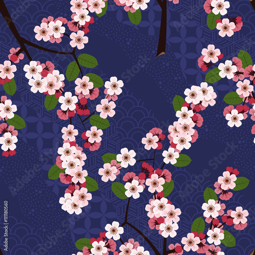 Seamless floral pattern with cherry sakura flowers on blue japanese background