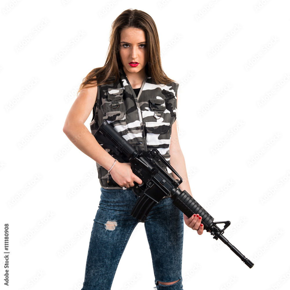 Young girl holding a rifle