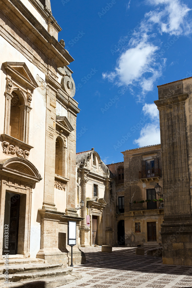 Salemi - Cobbled street in historic center , Jesuit Church. Trapani province, Sicily
