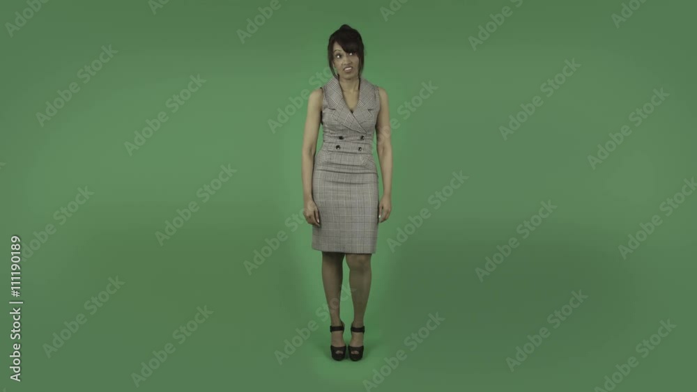 indian business woman yawning bored isolated on green indian business woman yawning bored isolated on green