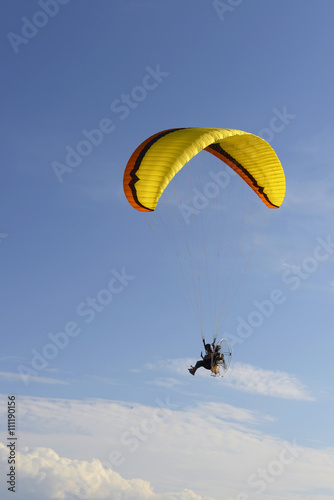 Paragliding in the sky and clouds