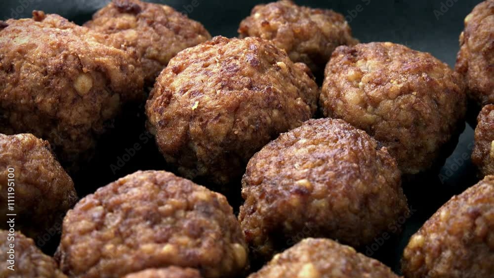 Portion of rotating Meatballs (fresh made; seamless loopable; 4K) Portion of rotating Meatballs (fresh made; seamless loopable; 4K)