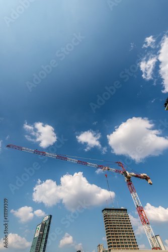 Grattacieli a Milano zona Isola con cielo azzurro e nuvole bianche photo