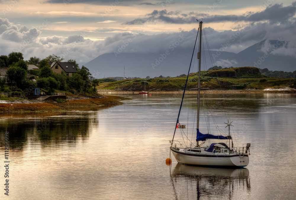 Sailing boat in Dunstaffnage Bay, Highlands, Scotland