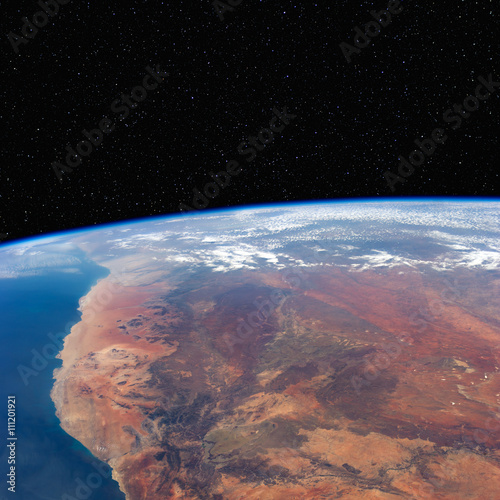 Fototapeta Naklejka Na Ścianę i Meble -  South Africa and Namibia from space with stars above. Includes NASA data.