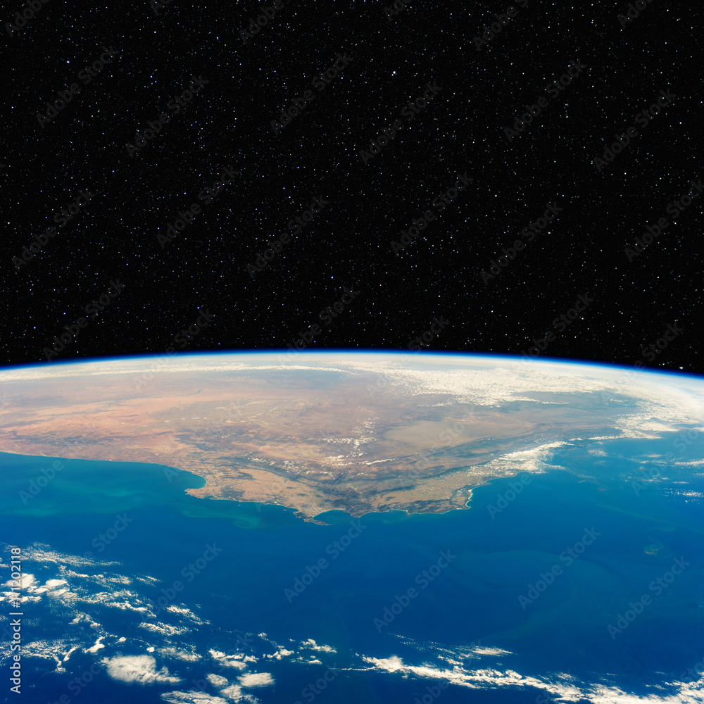 South Africa from space with stars above. Includes NASA data.