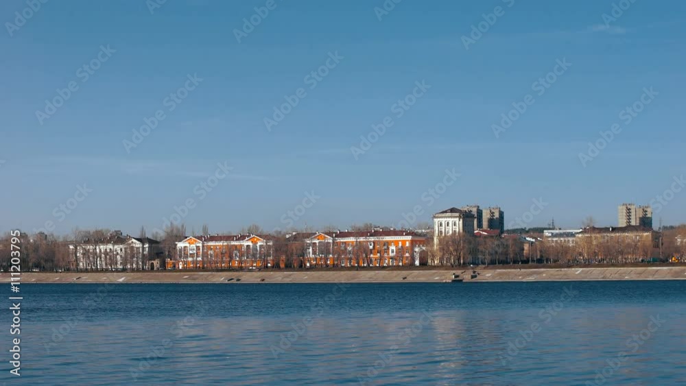 Provincial town on the bank of the river. Houses of the old buildings, the spring city. Provincial town on the bank of the river. Houses of the old buildings, the spring city.