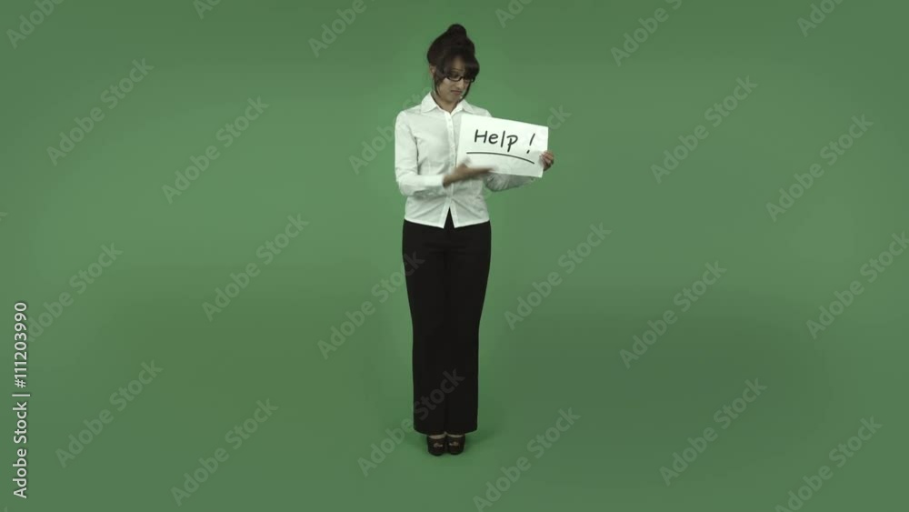 indian business woman isolated on green with help sign indian business woman isolated on green with help sign