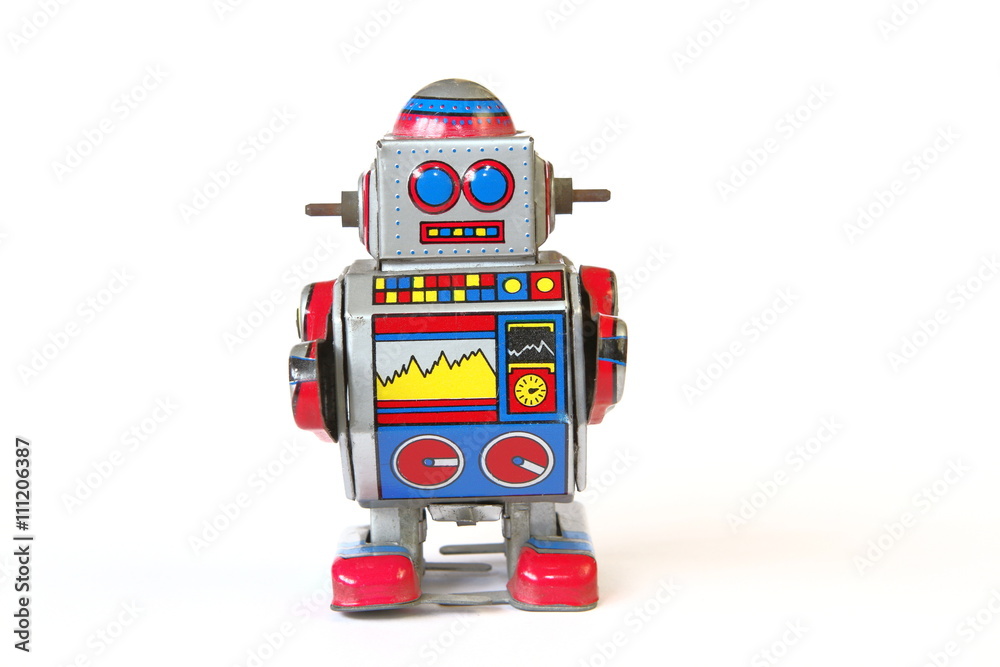 Fototapeta premium isolated vintage tin robot toy, straight face without key on white background