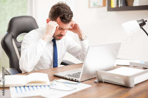 Lawyer feeling stressed at work