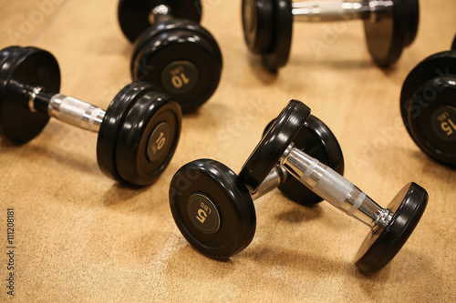 Sport equipment in fitness room or gym room, relax room for healthy people, Dumbbell in fitness and gym room.