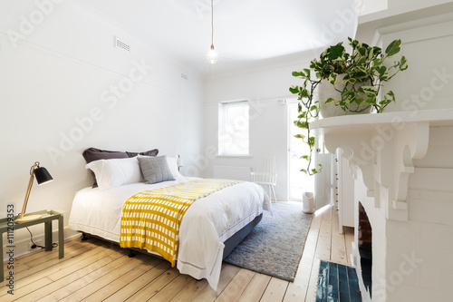 Obraz na plátně Luxury guest bedroom in vintage scandi styled home