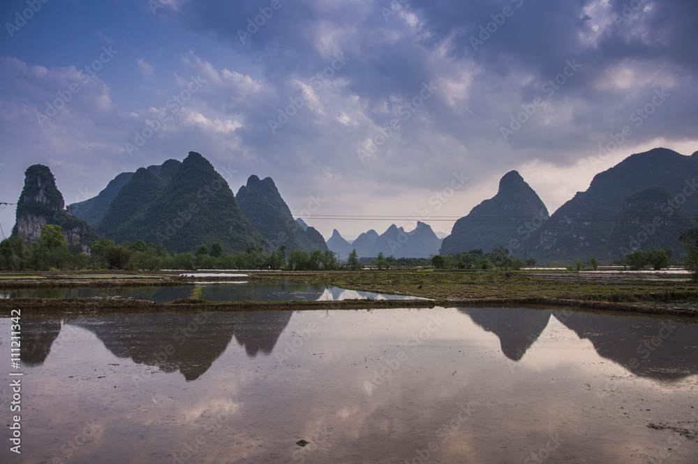 The beautiful karst mountains and rural scenery in spring
