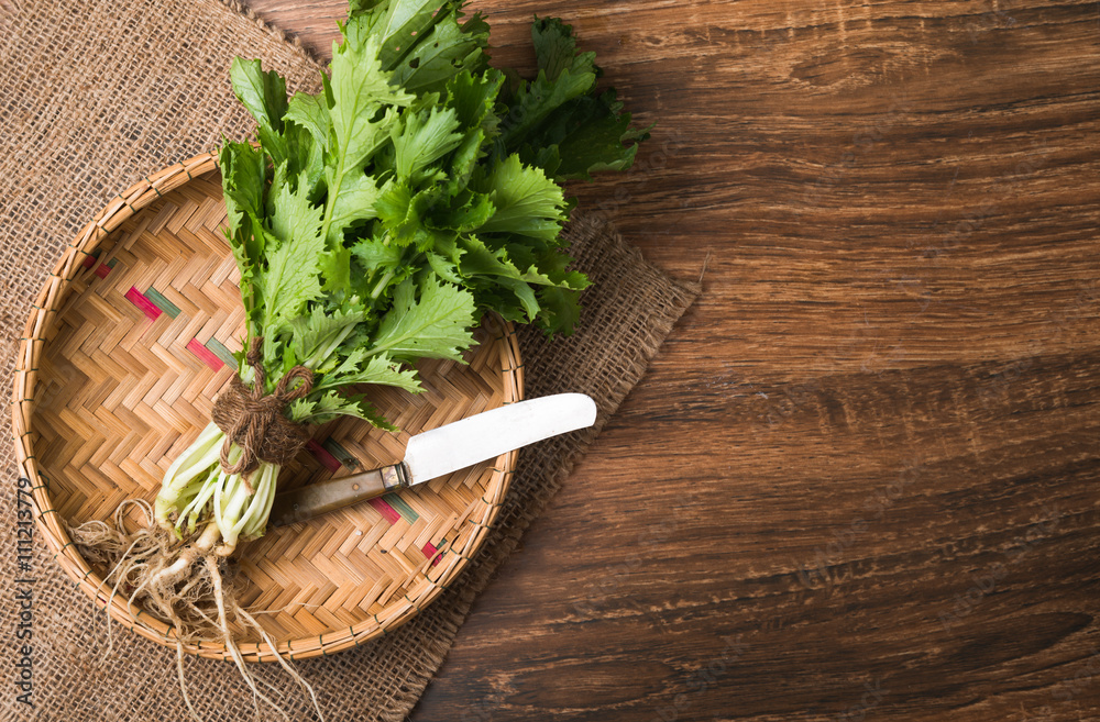 mizuna vegetation in basket