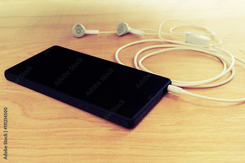Smart phone black screen with earphone Smart phone black screen with earphone