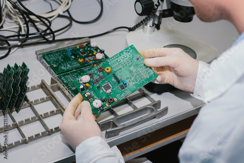 Microchip production factory. Computer expert
