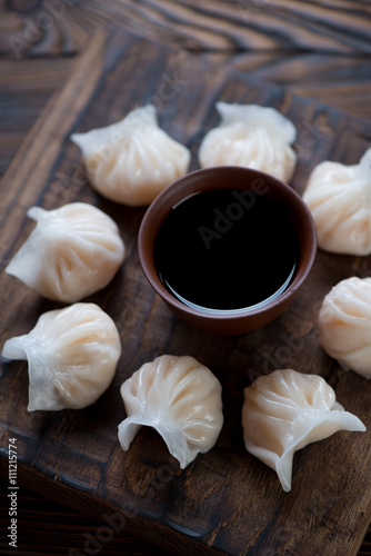 Closeup of steamed dim-sums with prawns, selective focus