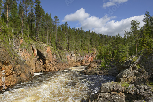 River Oulankajoki is heart of Oulanka National Park. Waters of 135-kilometre-long river originate from Salla mires and actual river begins at Lake Aittajarvi photo