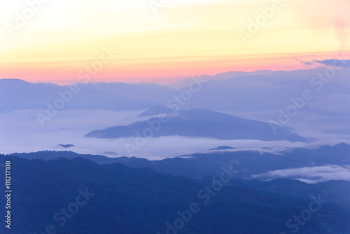 Skyline with mist and mountain.
