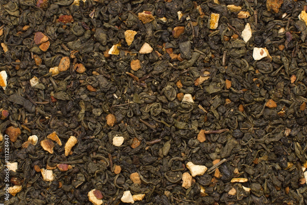 green tea leaves with citrus and fruits texture green tea leaves with citrus and fruits texture