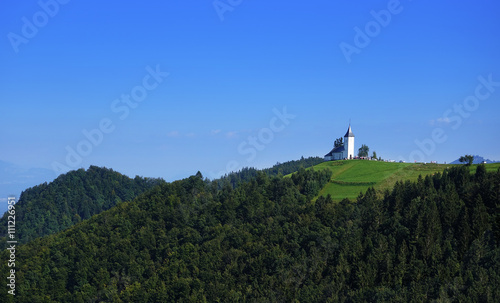 Church of St. Primoz near Jamnik with Alps  Slovenia  Europe