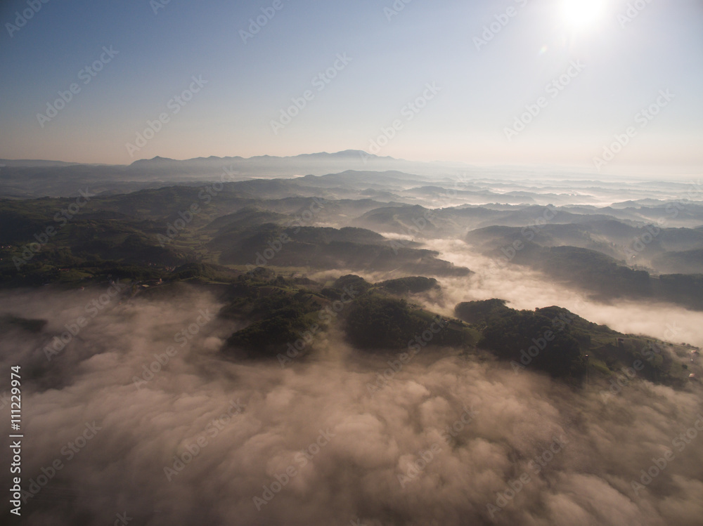 Aerial view of misty hills