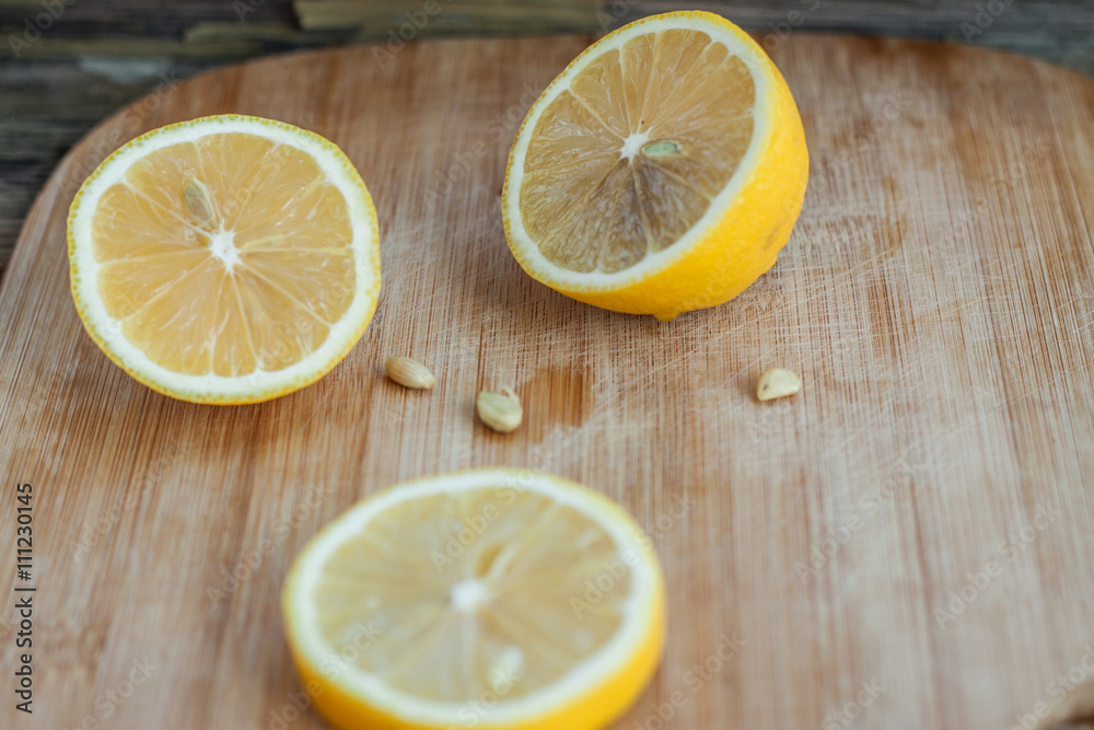 sliced lemon lies on a tree sliced lemon lies on a tree