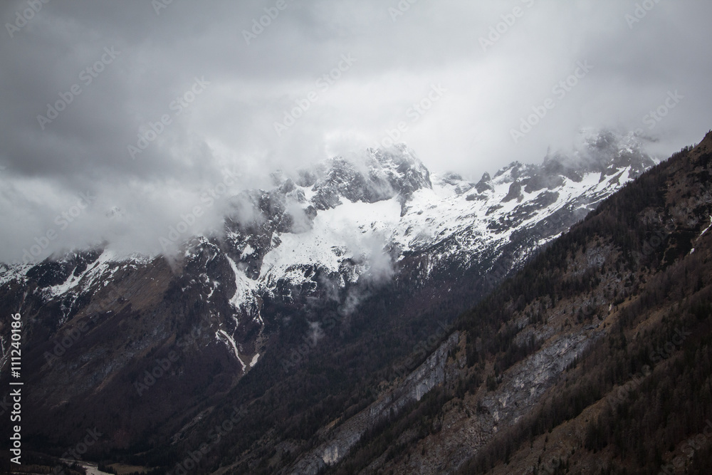 hills covered in snow and clouds in Norway hills covered in snow and clouds in Norway