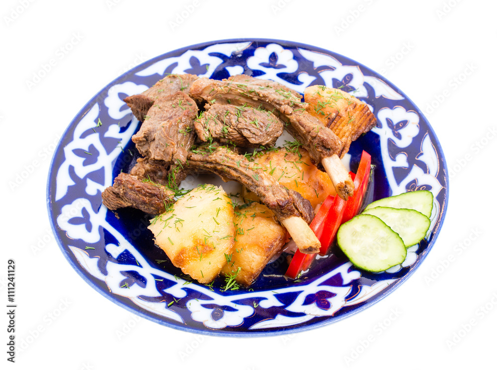 Baked lamb racks with vegetables garnish. Baked lamb racks with vegetables garnish.