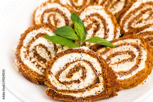 Delicious swiss roll with cream cheese.