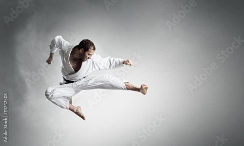 Karate man training © Sergey Nivens