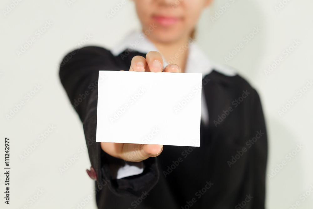 businesswoman asia holding and shown a business card on white ba businesswoman asia holding and shown a business card on white ba