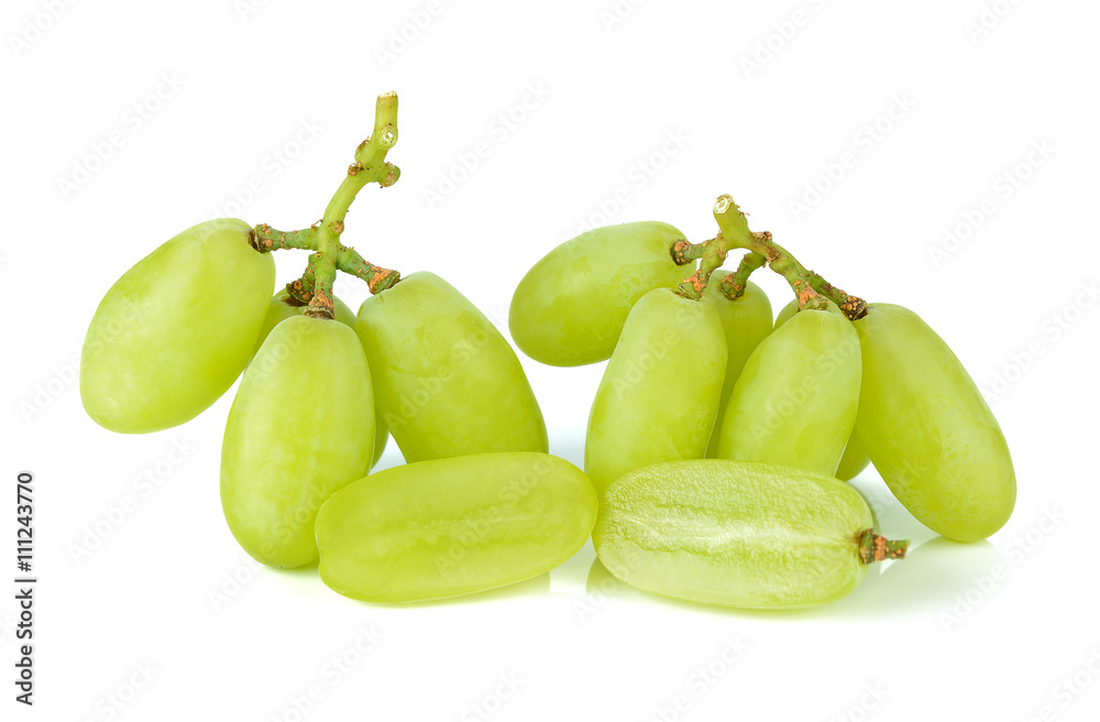 bunch of ripe and juicy green grapes close-up on a white backgro bunch of ripe and juicy green grapes close-up on a white backgro